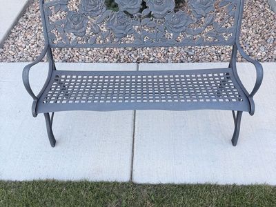 Metal Garden Bench with Rose Floral Backrest and it is 50 inches long