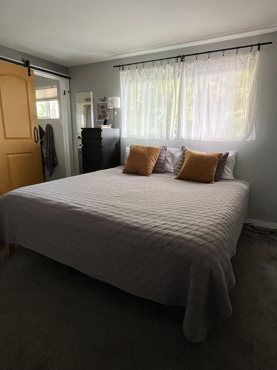 King mattress and wood frame