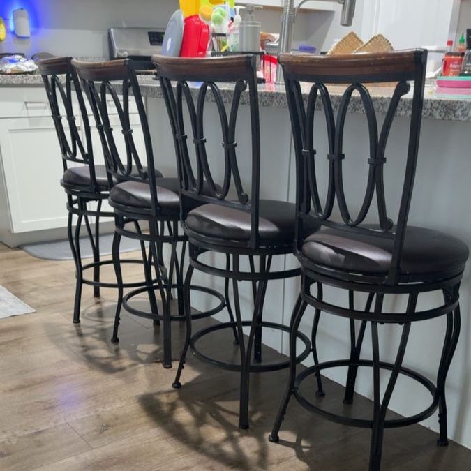 4 swivel counter chairs