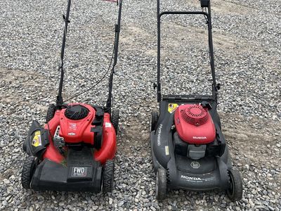 Troy Bilt and Honda lawn mowers