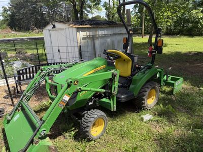 John Deere 1023E Sub-Compact Tractor with Loader, Box Blade and Tiller.