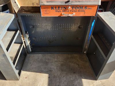 heavy-duty vintage industrial steel wall cabinet with pegboard backing,