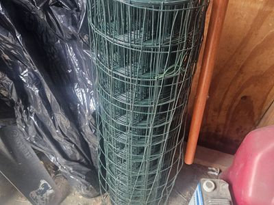 Assorted Rolls of Wire: Farm Gard Electric Fence Wire, Hillman Galvanized Wire, and PVC Coated Wire