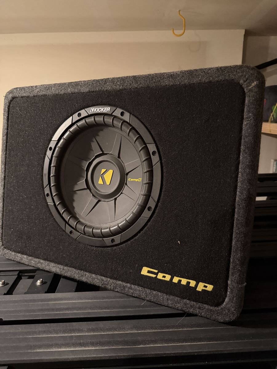Kicker 10” subwoofer and boss 1100 watt amp