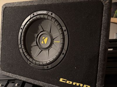Kicker 10” subwoofer and boss 1100 watt amp
