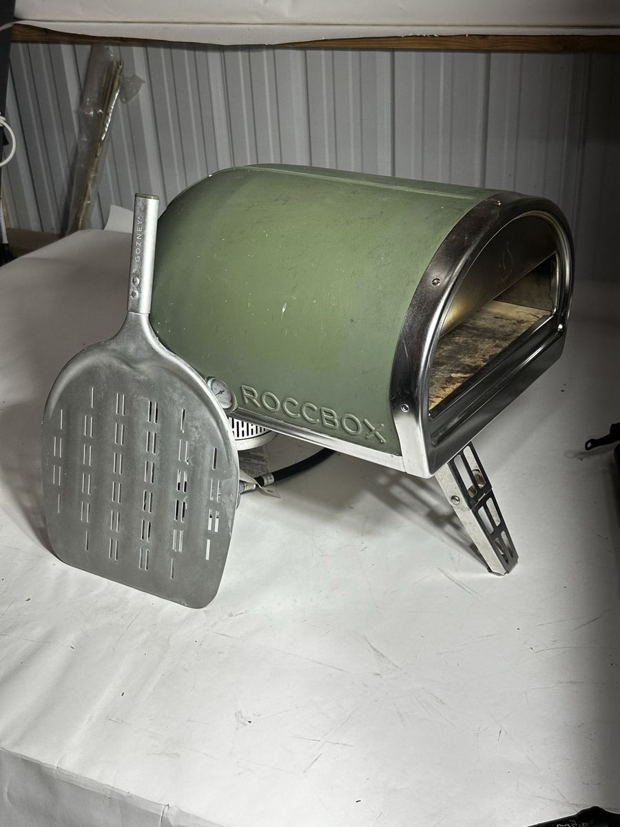 Gozney roccbox pizza oven with carry cover and peel