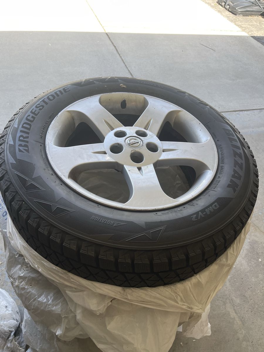 Bridgestone blizzard snow tires and rims
