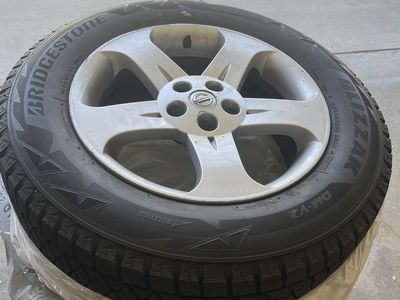 Bridgestone blizzard snow tires and rims
