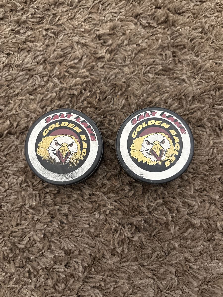 Game used Salt Lake Golden Eagles pucks
