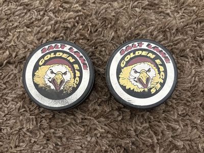 Game used Salt Lake Golden Eagles pucks