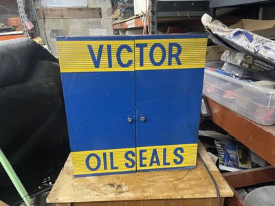 Vintage Victor Oil Seals Metal Display Cabinet with Assorted NOS Seals Content