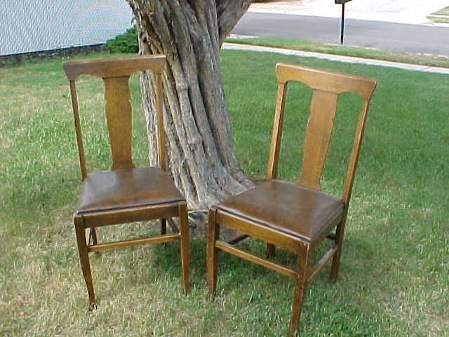 Two Oak Chairs..about 100 years old good shape...