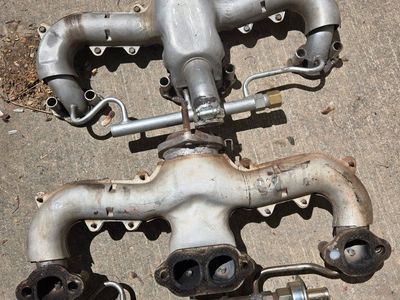1984 Corvette OEM headers
also have rear underside spare tire bracket