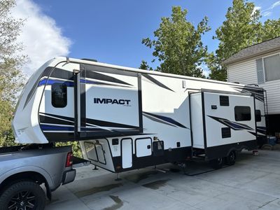2019 Keystone Impact 3219 by Fuzion 5th Wheel Toy Hauler - Sleeps 8, Generator, Solar