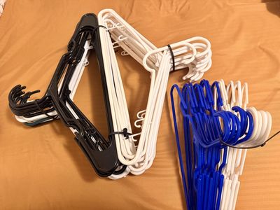 Little hangers and big hangers, 51 total, blue, black, white