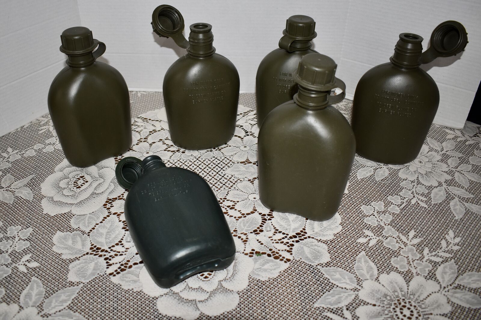 Six ( 6 ) Vintage Quart Olive Green Water Canteens - 5  Of Them Are 1976  U.S. Military R&D  That Have Never Been Used.