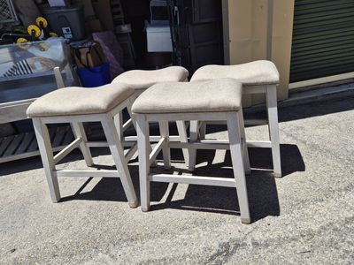Ashley Furniture - Skempton - Set of 4 Upholstered Bar Stools - Light Wood Finish, 24" Seat Height, Counter Height Chairs