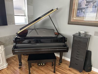 Gulbransen glossy black baby grand piano