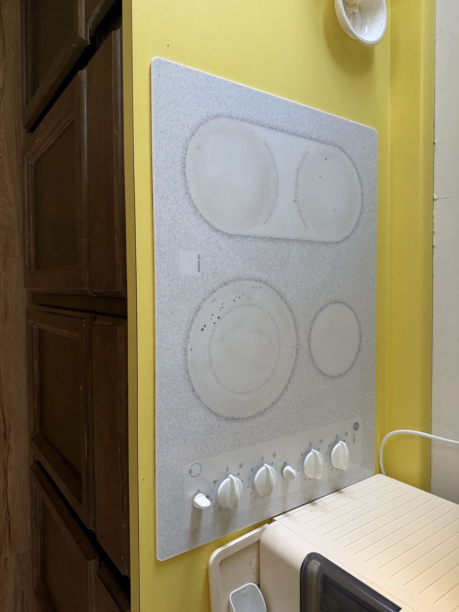 GE Profile 4-Burner Electric Cooktop in White, Used