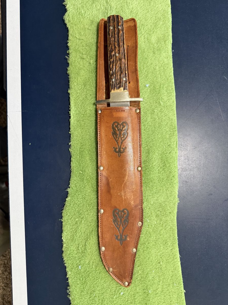 Vintage Handcrafted Knife with Leather Sheath & Stag Handle - Unique Collectible.