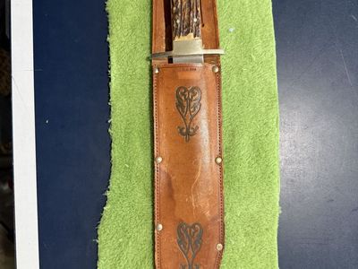 Vintage Handcrafted Knife with Leather Sheath & Stag Handle - Unique Collectible.