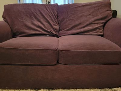 Plumb colored love seat, oversized chair and ottoman
