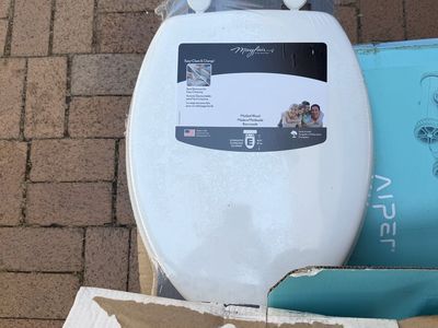 New elongated toilet seats