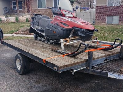 trailer and snowmobile