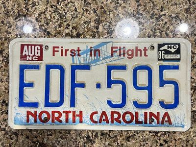 1986 North Carolina "First in Flight" License Plate - Vintage Car Tag EDF 595