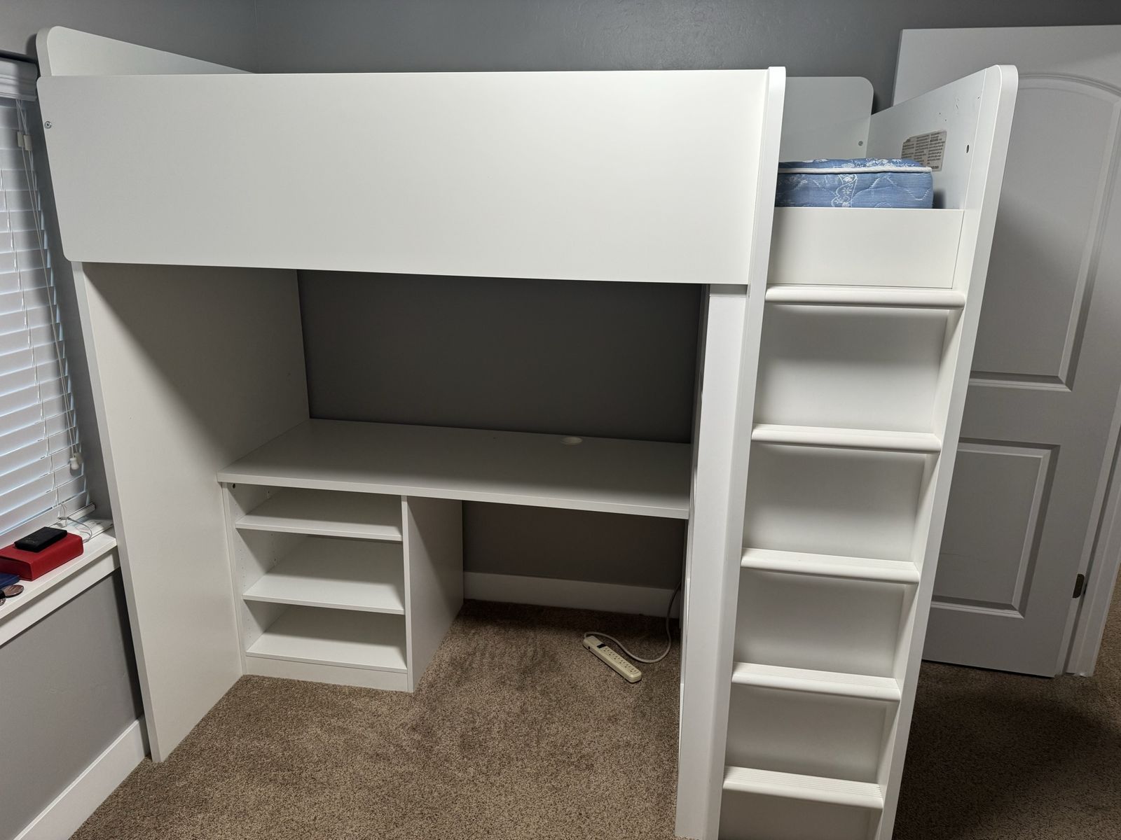 IKEA loft bed with desk and storage
