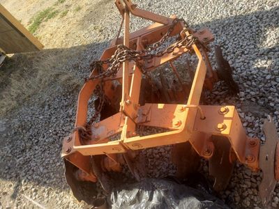 Orange Heavy-Duty Agricultural Disc Plow/Tiller Farm Implement, Used