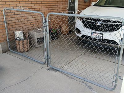 Chain link gate they are 57 inch wide and 46 inches high they are in fair shape also have the brackets to hang them.