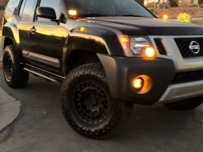 Nissan Xterra Off-Road with Rooftop Tent