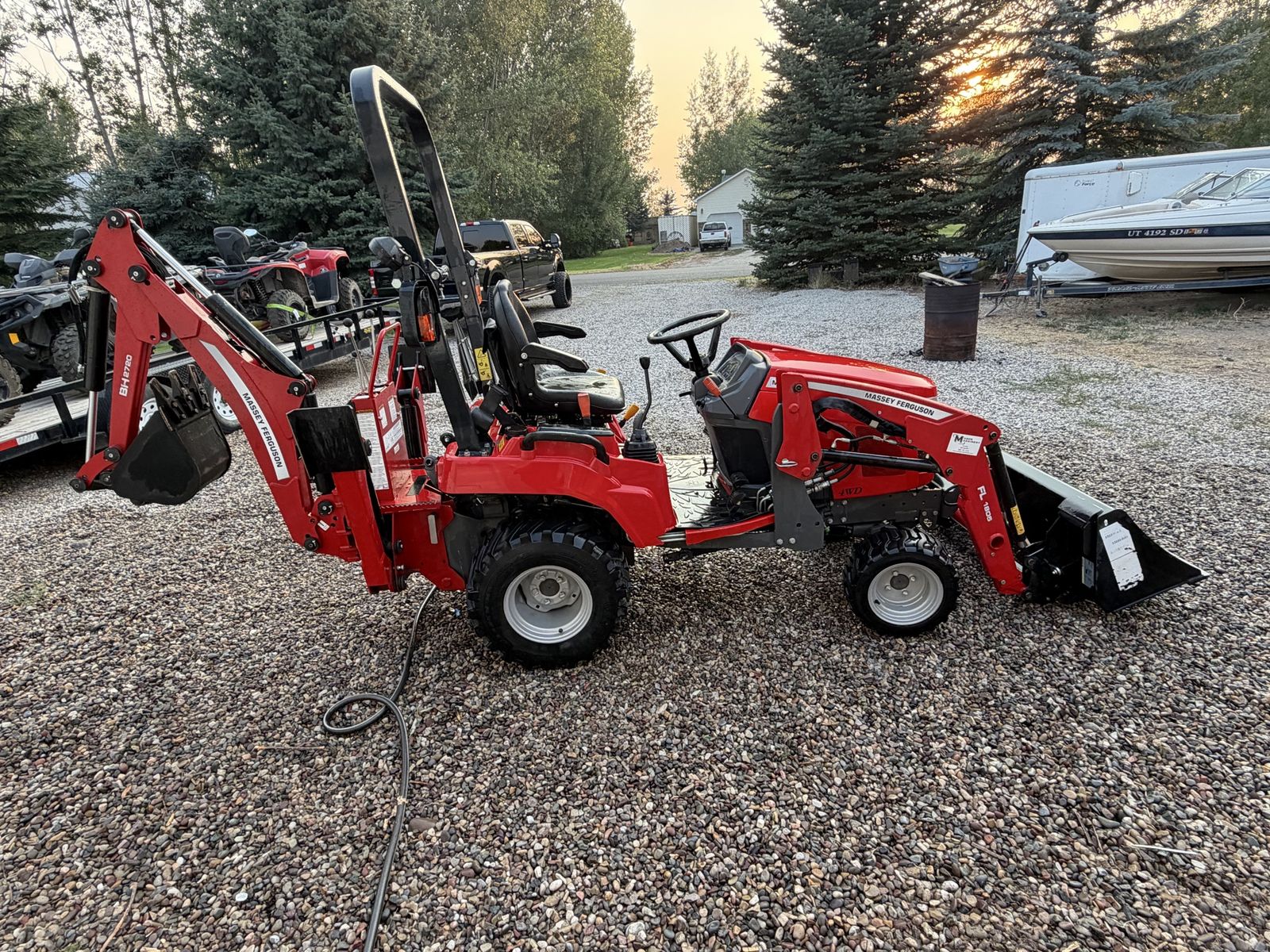 Massey Ferguson GC1725M Sub-Compact Tractor with FL1805 Front Loader, forks and BH2720 backhoe. roughly 180 hours. $18,000