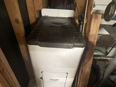 Vintage antique wood burning enamel stove