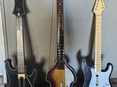lot of 3 untested guitar hero/rock band guitars