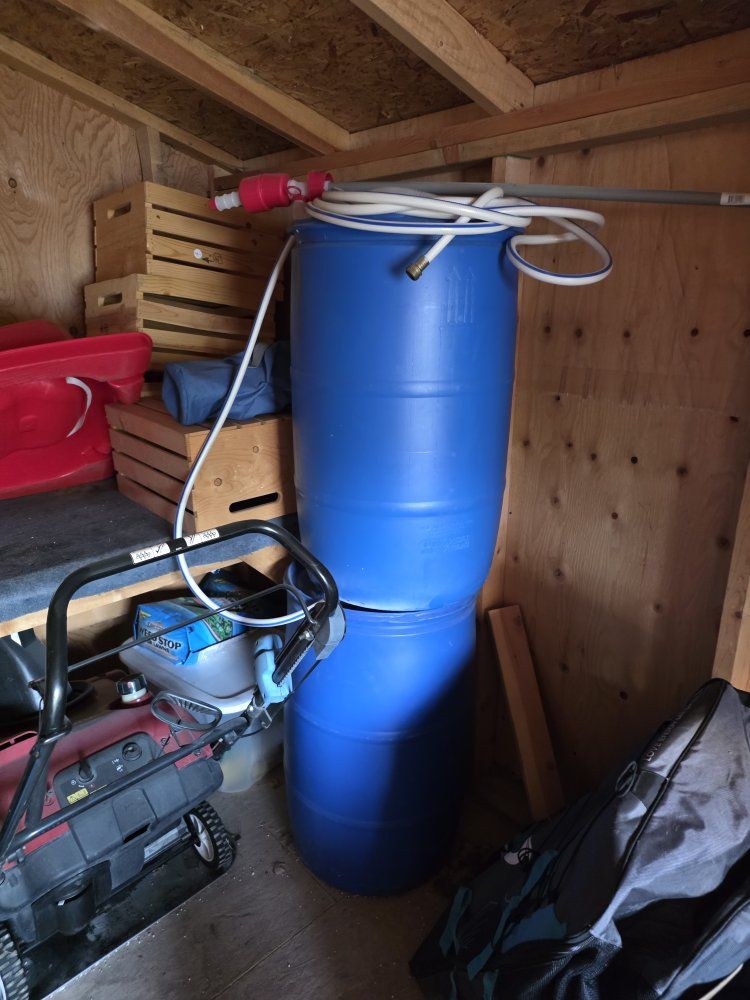 2 storage water tanks with pump