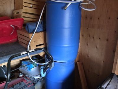 2 storage water tanks with pump