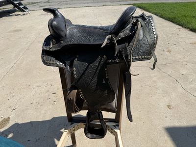 Black Western Leather Horse Saddle with Floral Tooling and Studded Trim