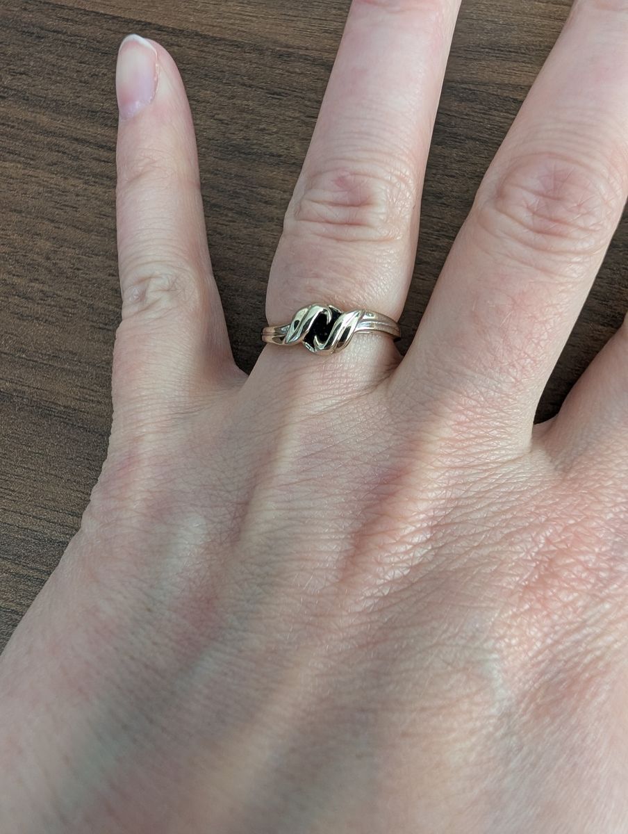 White gold with black opal ring.