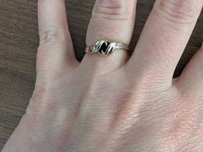 White gold with black opal ring.
