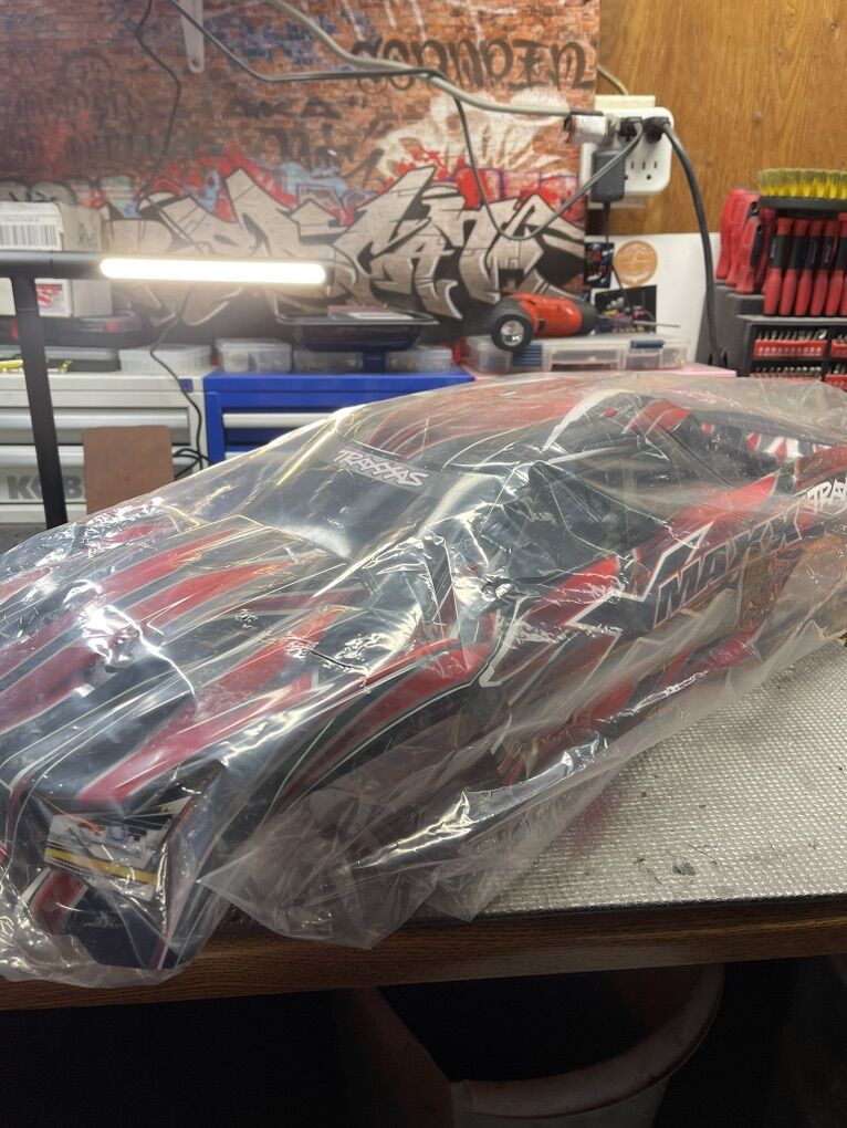 Brand new Traxxas Xmaxx body red   $80