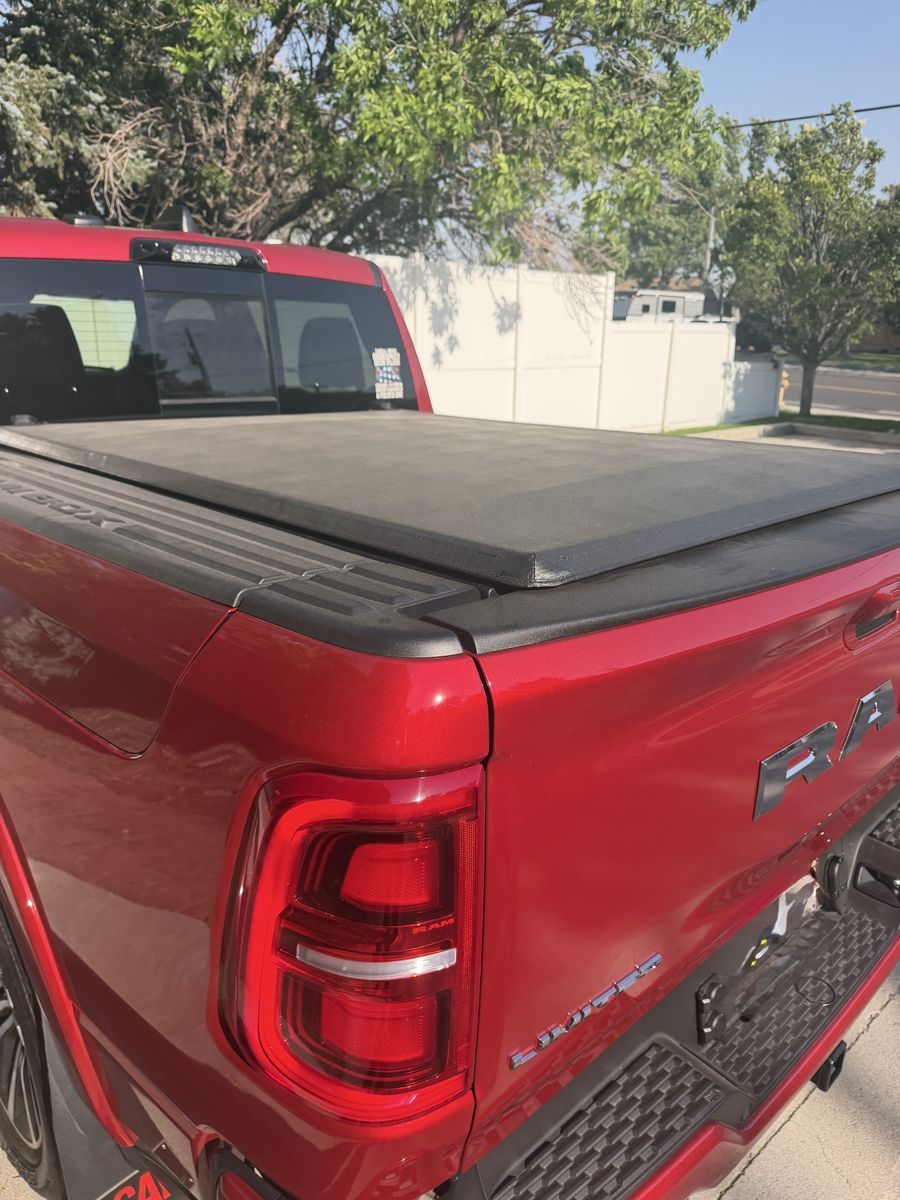 Tonneau cover for a 2019-2026 Ram 1500 5' 7” bed with Ram boxes. Soft Tri-Fold Tonneau Cover