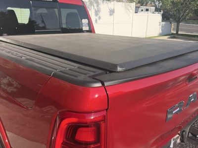 Tonneau cover for a 2019-2026 Ram 1500 5' 7” bed with Ram boxes. Soft Tri-Fold Tonneau Cover