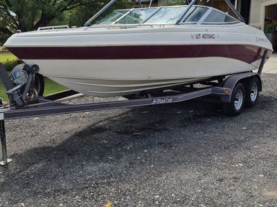 1999 Caravelle wakeboard, ski and run around boat.