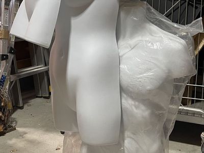 3 hard plastic hanging torso mannequins with white adjustable costumer stand in great condition.