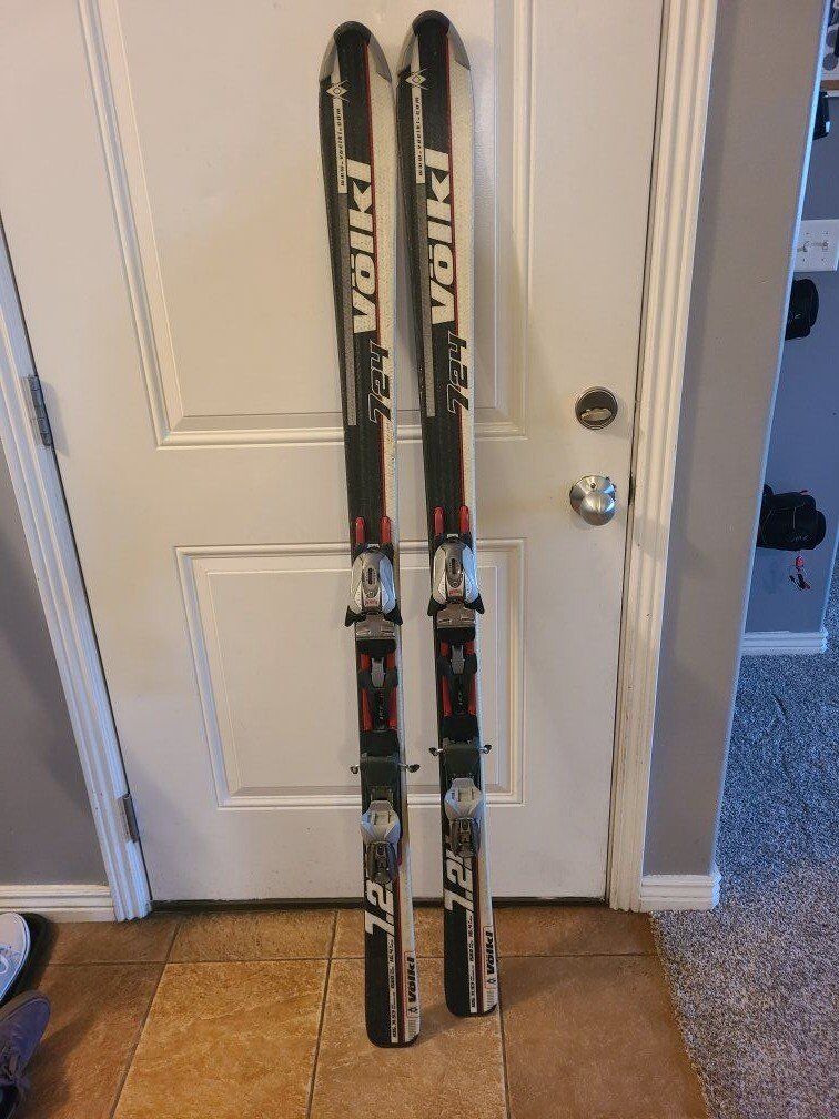 156cm volkl skis (boots and poles also)
