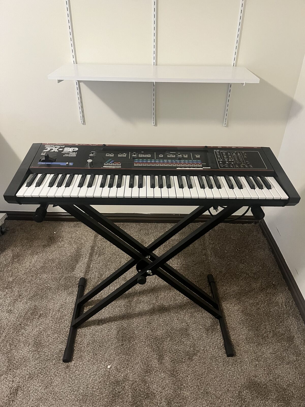 Roland JX3P and PG 200, with cord and stand