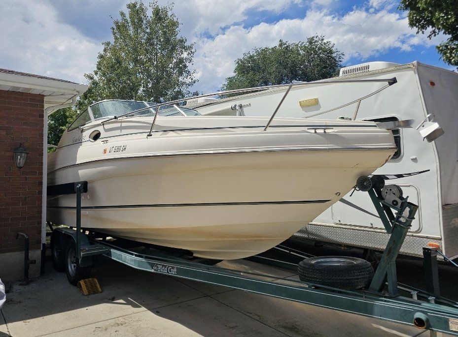 Rinker 232 cuddy Boat w/ brand new Mercury Engine, Trailer Included - Used