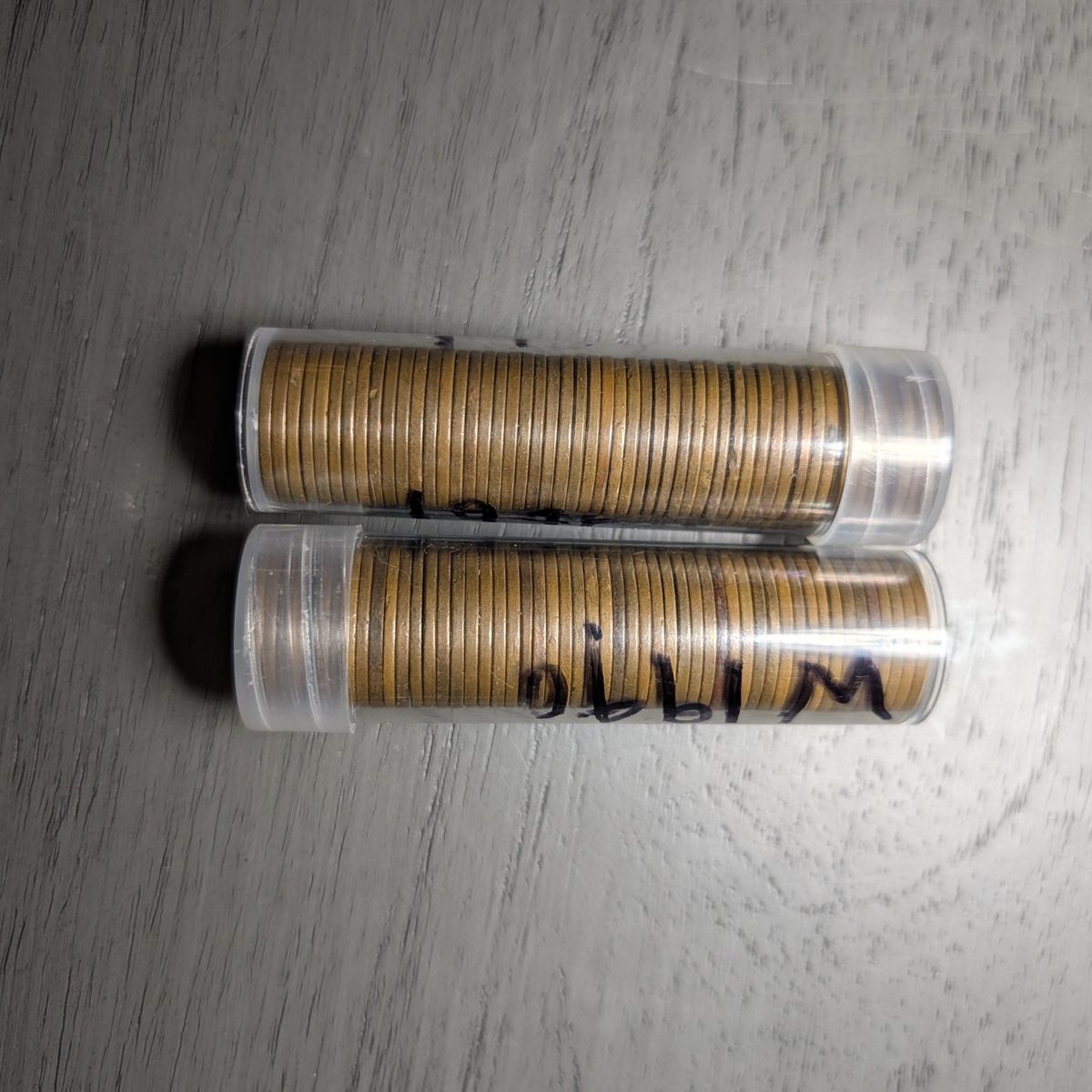 two rolls of wheat pennies